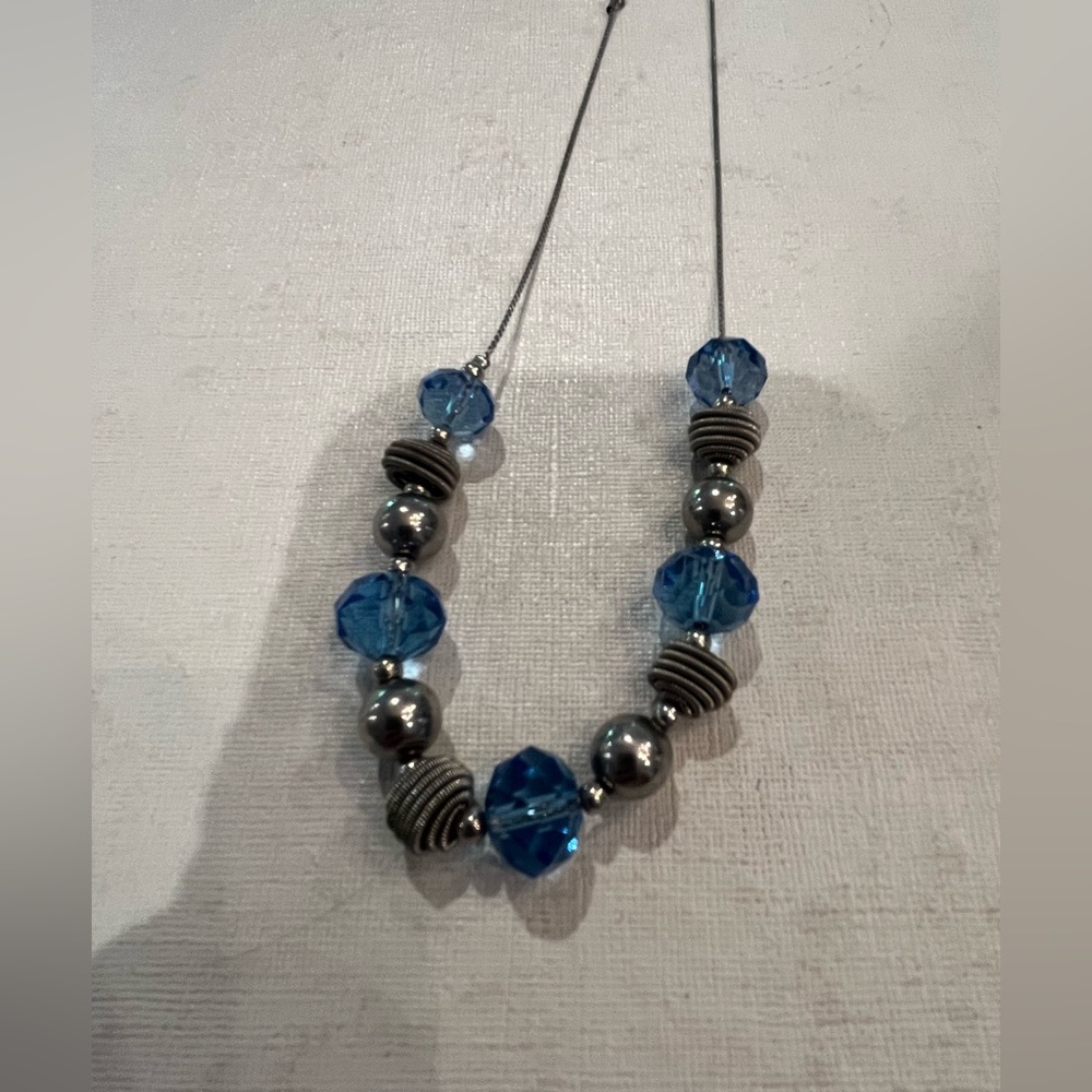 Vintage 2028 light blue Briolet cut crystal and slinky style bead necklace. GUC